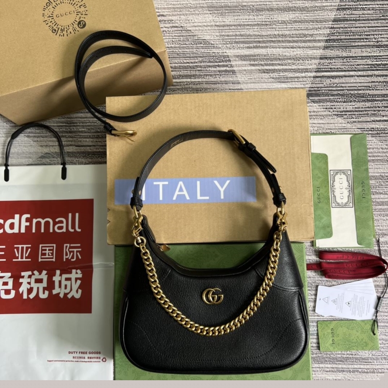 G*u*i top handle bags